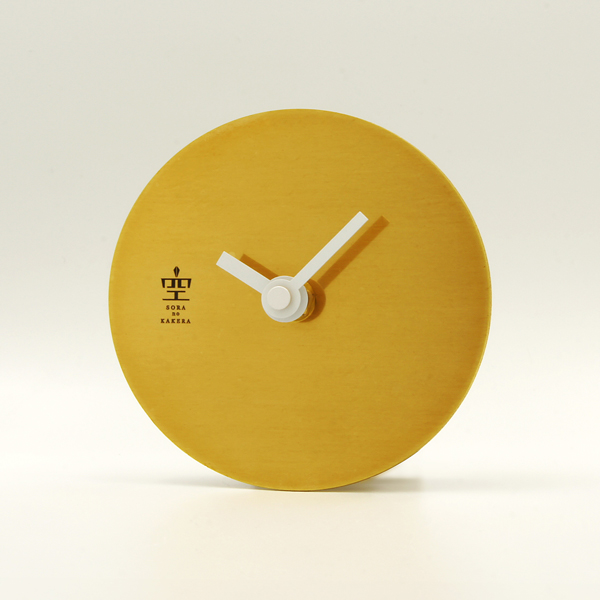 志賀正章がデザインした金属の時計　titleはcircle clock 100 brass