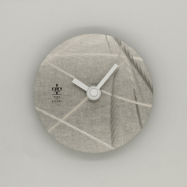 志賀正章がデザインした金属の時計　titleはcircle clock 100 sus ivy